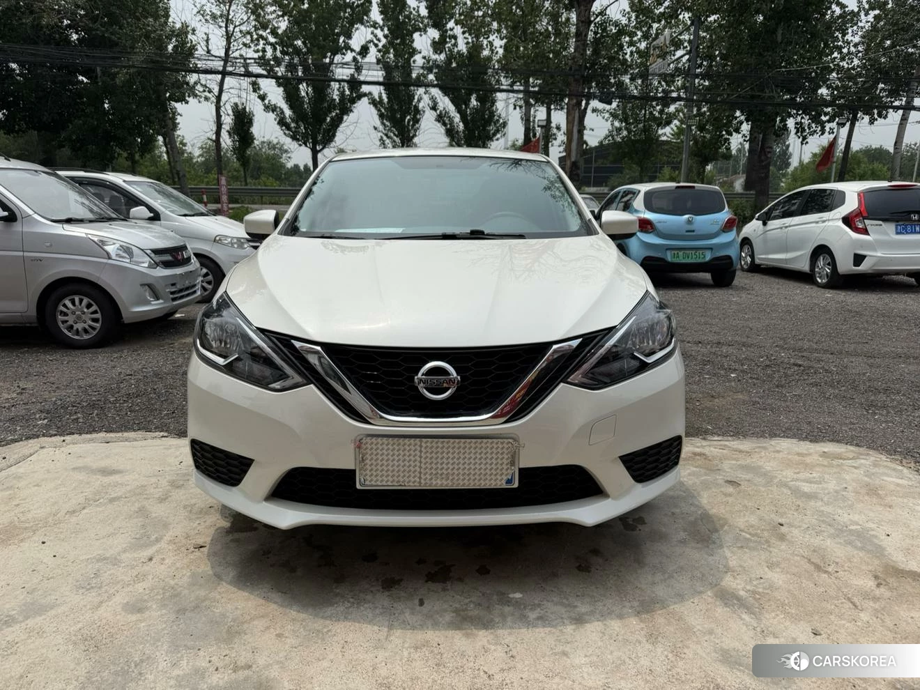 Nissan Xuan Yi 2024 Белый из Китая, фото 2