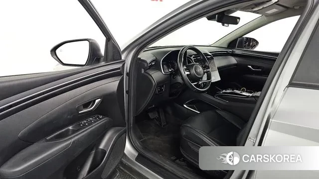 Hyundai Tucson (NX4) 2022 Серебристо-серый из Кореи, фото 2