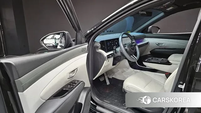 Hyundai The New Tucson Hybrid (NX4) 2024 Черный из Кореи, фото 2