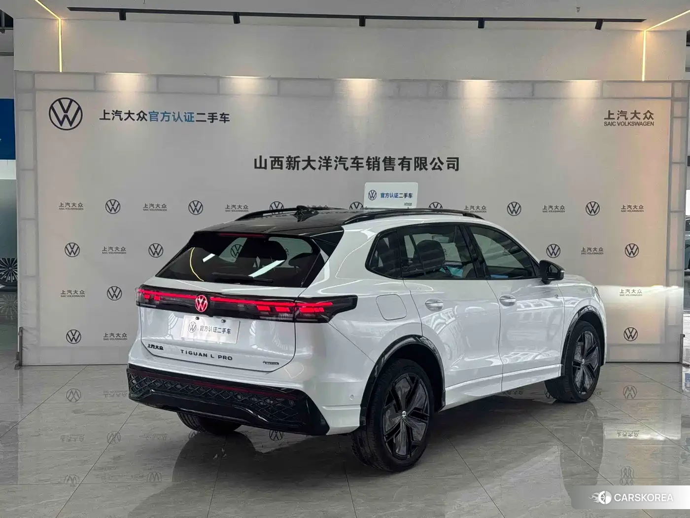 Volkswagen Tiguan L 2024 Белый из Китая, фото 2