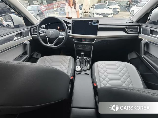 Volkswagen Tanyue 2023 Белый из Китая, фото 2