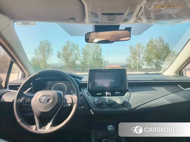 Toyota Corolla 2023 Белый из Китая, фото 2