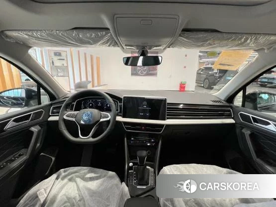 Volkswagen Tiguan L PHEV 2025 Черный из Китая, фото 2