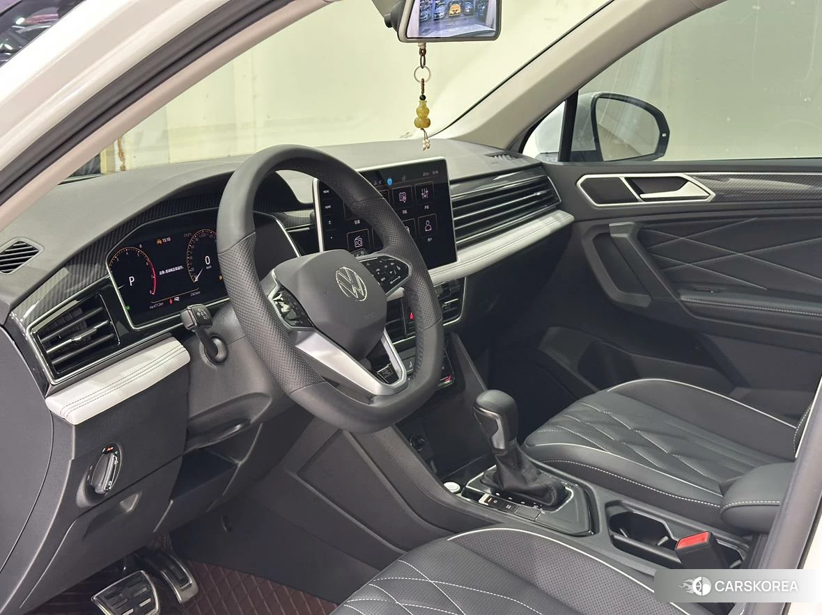 Volkswagen Tiguan L 2023 Белый из Китая, фото 2