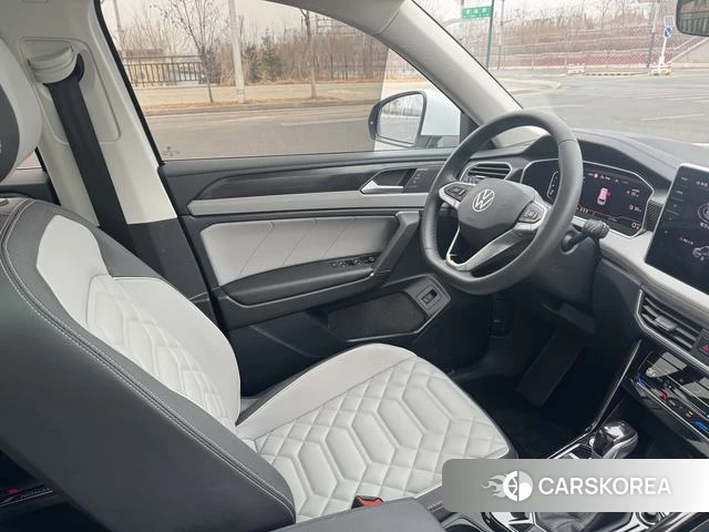 Volkswagen Tanyue 2023 Белый из Китая, фото 2