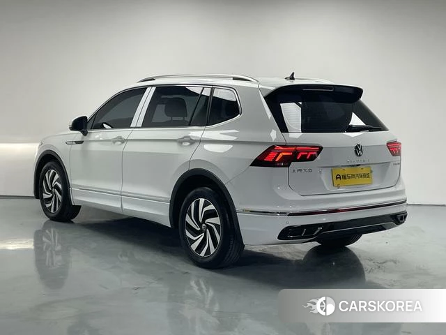 Volkswagen Tiguan L 2024 Белый из Китая, фото 2