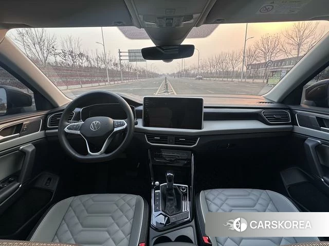 Volkswagen Tanyue 2022 Черный из Китая, фото 2
