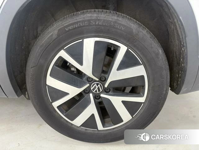 Volkswagen Tanyue 2023 Белый из Китая, фото 2