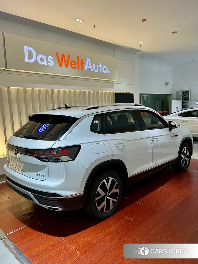 Volkswagen Tanyue 2023 Белый из Китая, фото 2