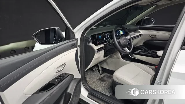 Hyundai The New Tucson Hybrid (NX4) 2024 Белый из Кореи, фото 2