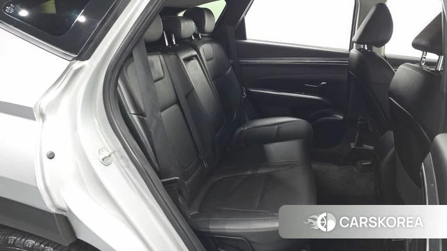 Hyundai Tucson (NX4) 2022 Серебристо-серый из Кореи, фото 2