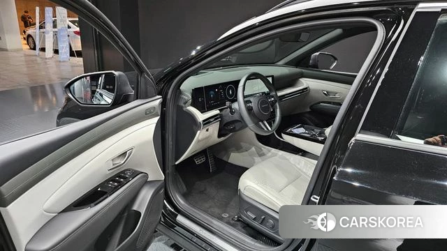 Hyundai The New Tucson Hybrid (NX4) 2024 Черный из Кореи, фото 2