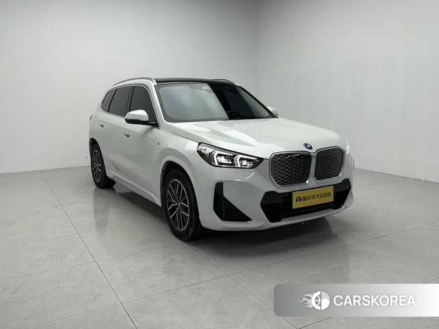 BMW iX1 2024 Белый из Китая, фото 2
