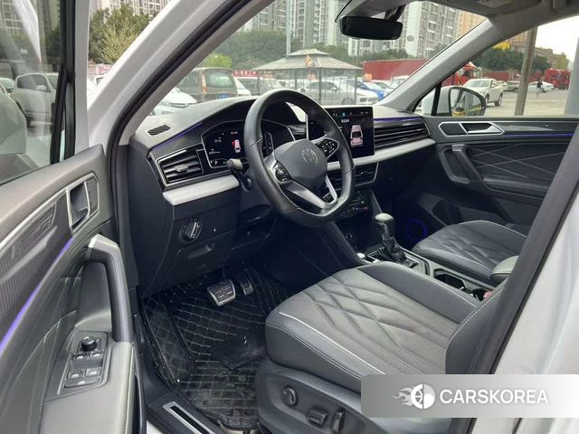 Volkswagen Tiguan L 2023 Белый из Китая, фото 2