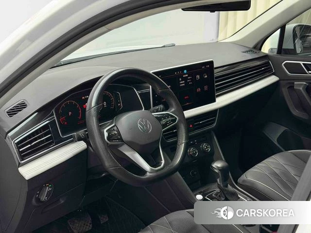 Volkswagen Tiguan L 2023 Белый из Китая, фото 2
