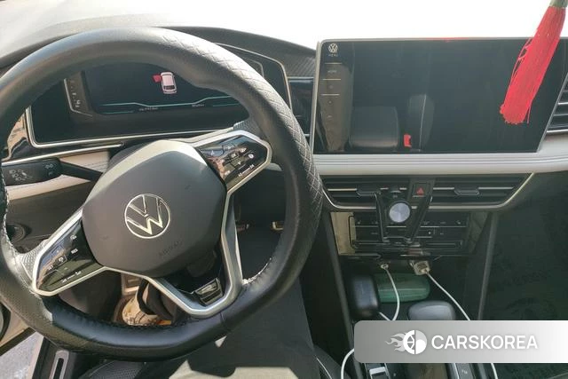 Volkswagen Tiguan L 2021 Белый из Китая, фото 2