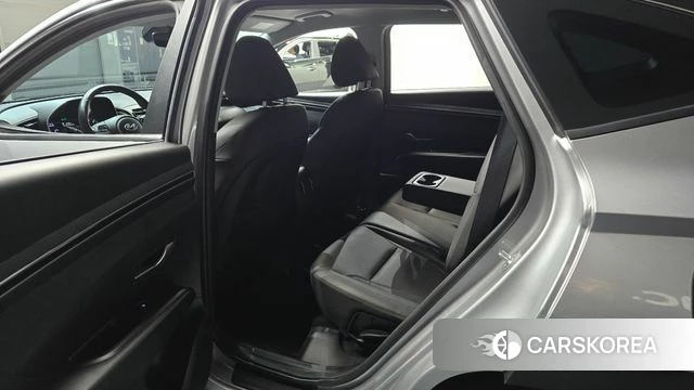 Hyundai Tucson (NX4) 2022 Серебристо-серый из Кореи, фото 2