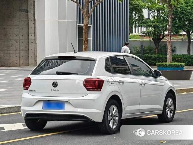 Volkswagen Polo 2023 Белый из Китая, фото 2