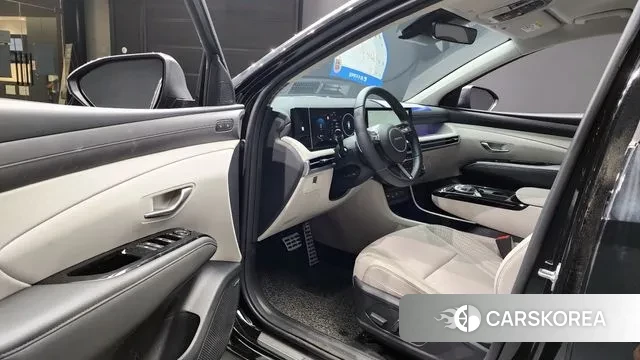 Hyundai The New Tucson Hybrid (NX4) 2024 Черный из Кореи, фото 2