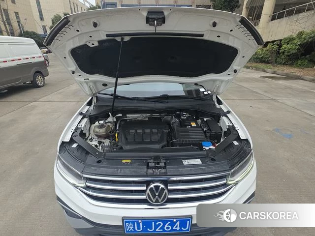 Volkswagen Tiguan L 2022 Белый из Китая, фото 2