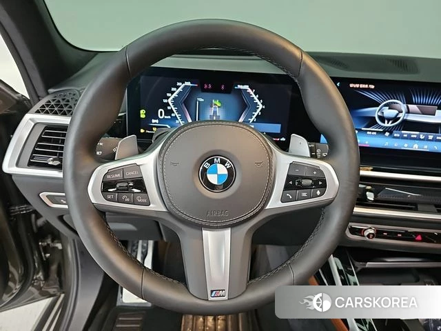 BMW X7 (G07) 2024 Светло-зеленый из Кореи, фото 2