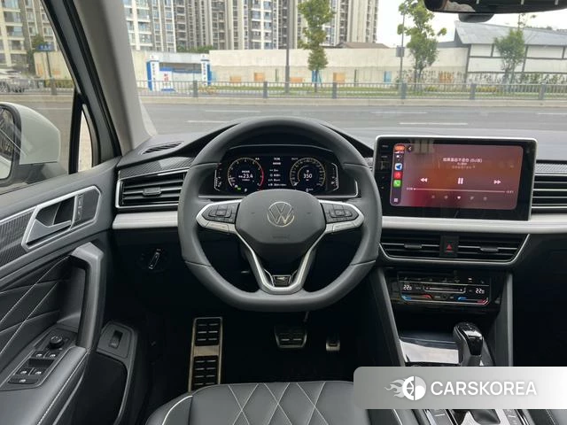 Volkswagen Tiguan L 2024 Белый из Китая, фото 2