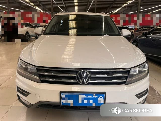 Volkswagen Tiguan L 2021 Белый из Китая, фото 2