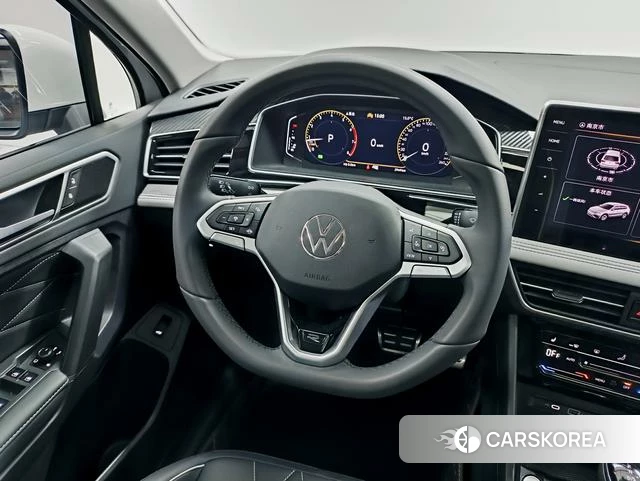 Volkswagen Tiguan L 2024 Белый из Китая, фото 2