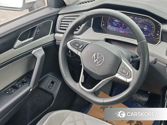 Volkswagen Tanyue 2023 Белый из Китая, фото 3