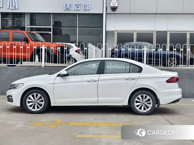 Volkswagen Bora 2022 Белый из Китая, фото 3