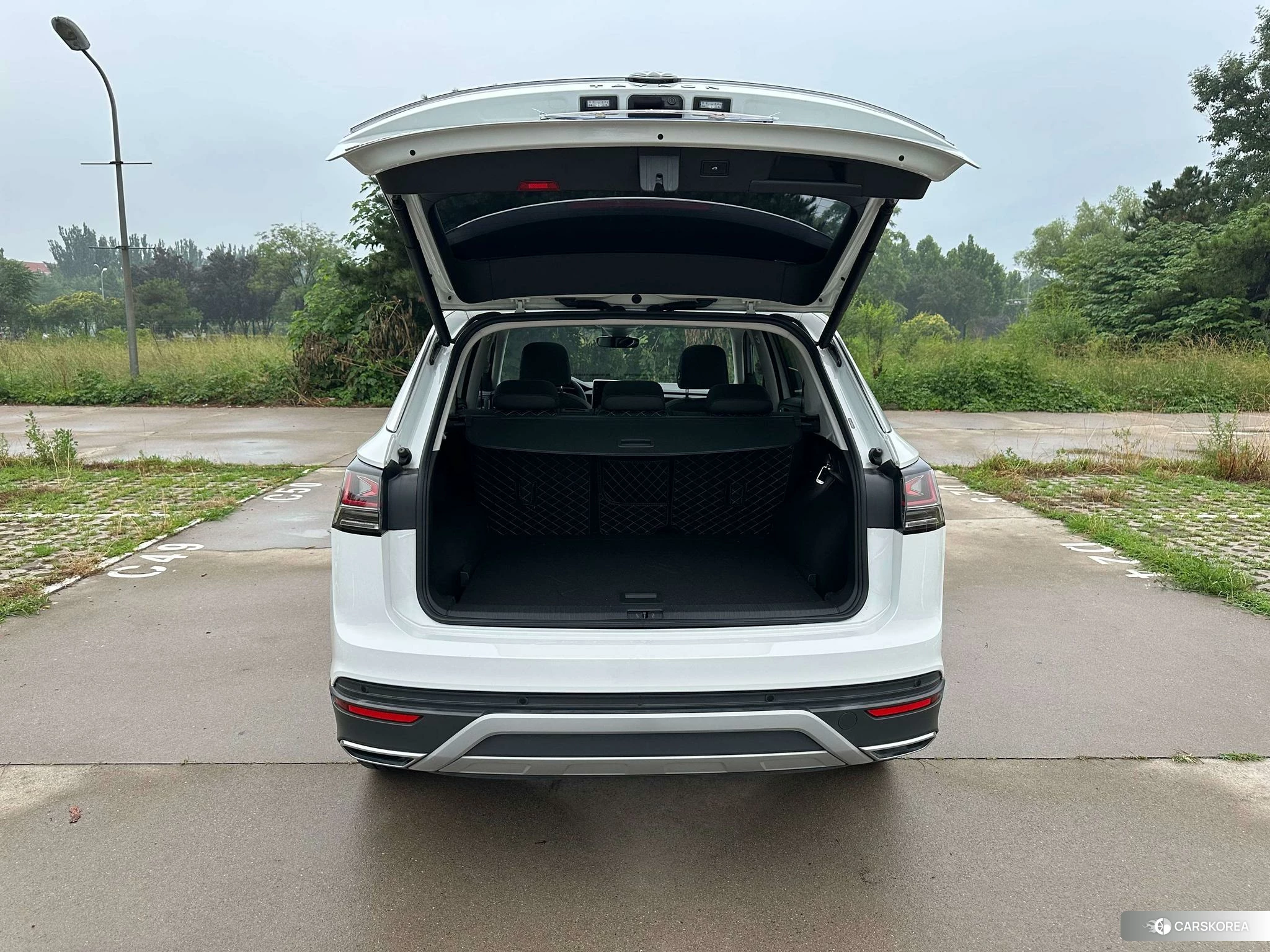 Volkswagen Tanyue 2023 Белый из Китая, фото 3