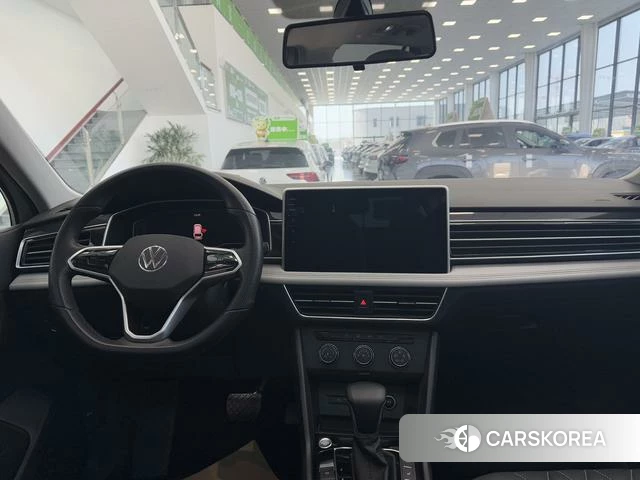 Volkswagen Tiguan L 2022 Темно-серый из Китая, фото 3