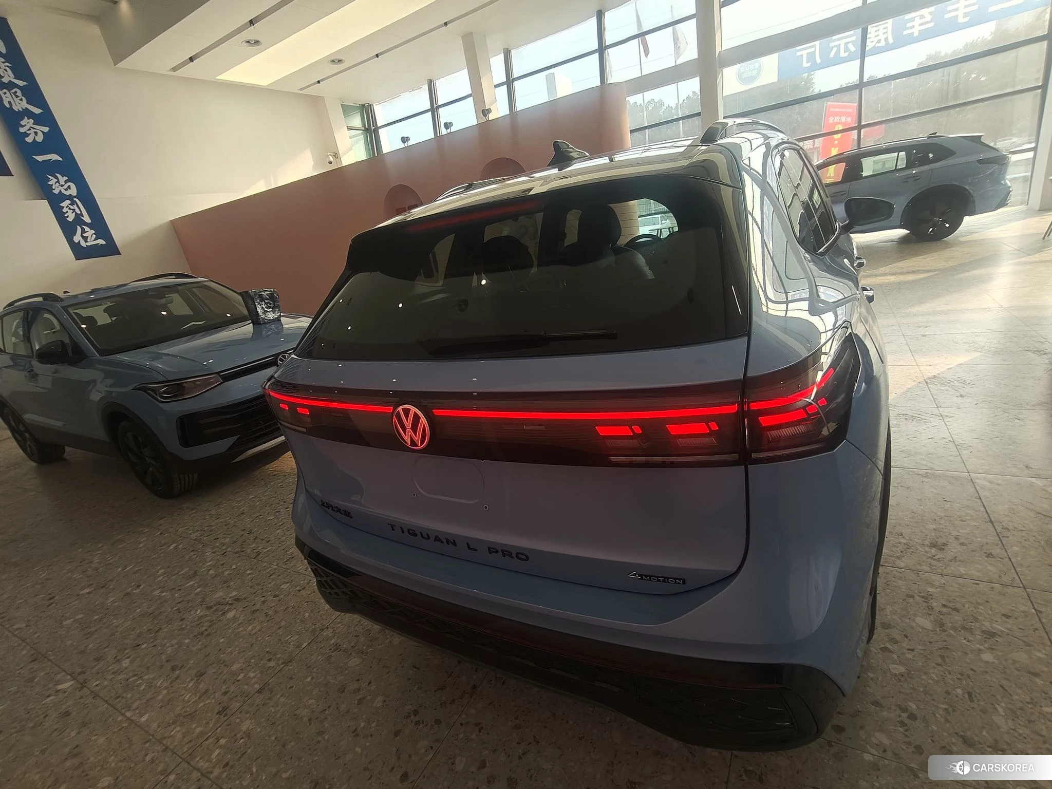 Volkswagen Tiguan L 2024 Синий из Китая, фото 3