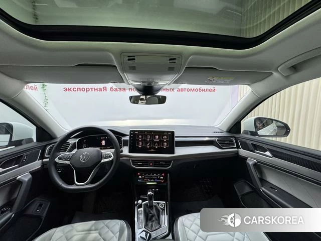 Volkswagen Tanyue 2023 Белый из Китая, фото 3