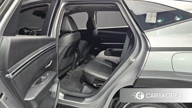 Hyundai Tucson (NX4) 2023 Серебристо-серый из Кореи, фото 3