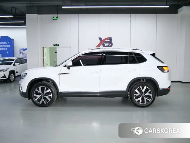Volkswagen Tanyue 2024 Белый из Китая, фото 3