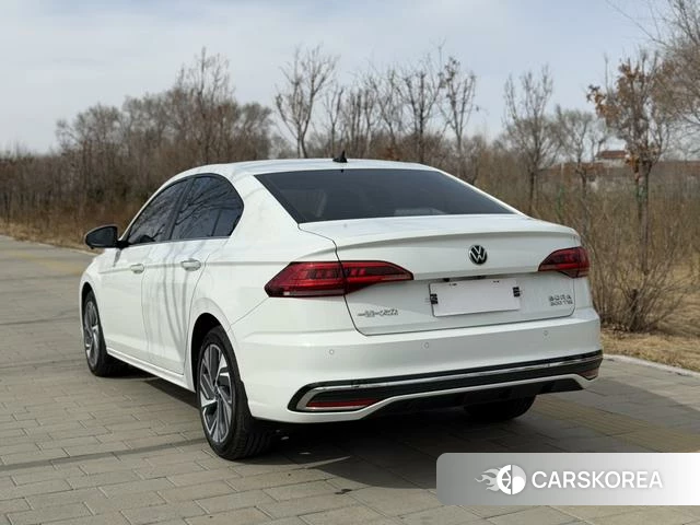 Volkswagen Bora 2022 Белый из Китая, фото 3