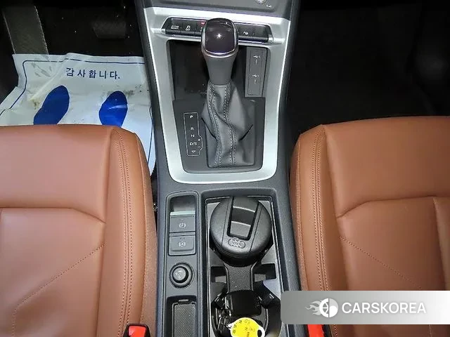 Audi Q3 (F3) 2024 Белый из Кореи, фото 3