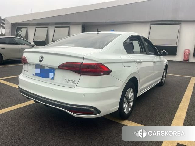 Volkswagen Bora 2023 Белый из Китая, фото 3