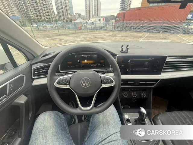 Volkswagen Tiguan L 2022 Белый из Китая, фото 3