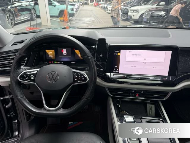 Volkswagen Tourang 2024 Черный из Китая, фото 3