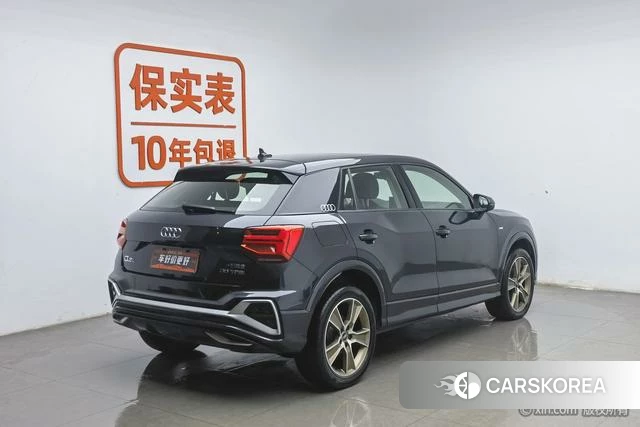 Audi Q2L 2022 Темно-серый из Китая, фото 3