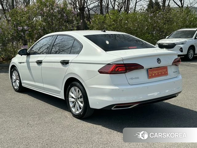 Volkswagen Bora 2022 Белый из Китая, фото 3