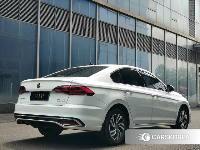 Volkswagen Bora 2022 Белый из Китая, фото 3