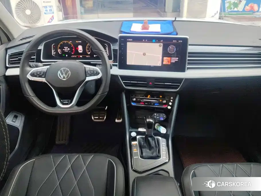 Volkswagen Tiguan L 2024 Белый из Китая, фото 3