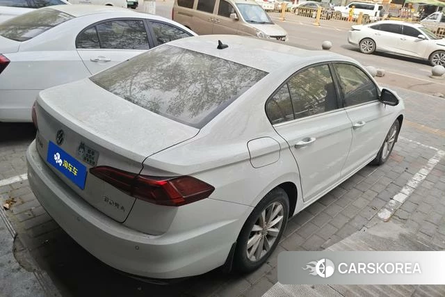 Volkswagen Bora 2021 Белый из Китая, фото 3