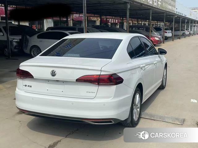 Volkswagen Bora 2021 Белый из Китая, фото 3