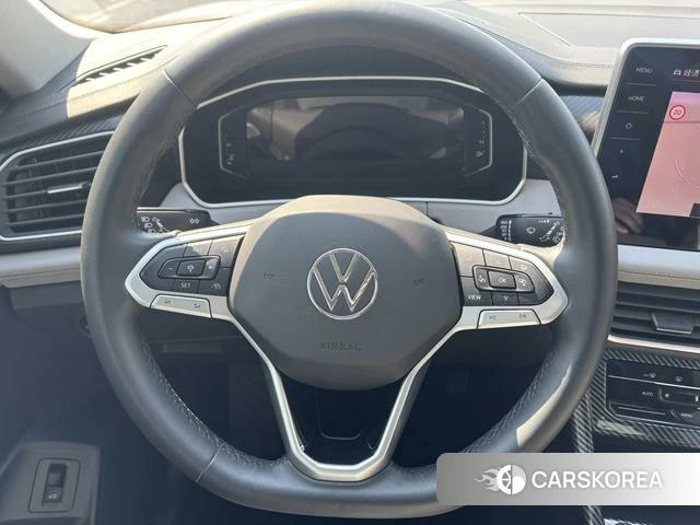 Volkswagen Tanyue 2023 Белый из Китая, фото 3