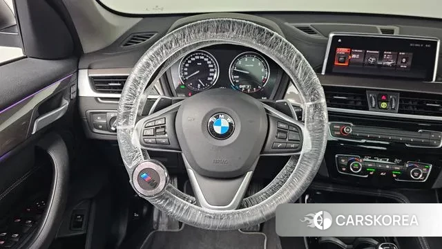 BMW X1 (F48) 2021 Черный из Кореи, фото 4