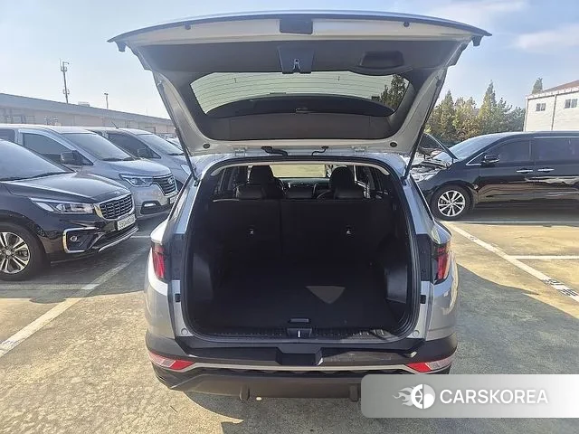 Hyundai Tucson (NX4) 2021 Серебристо-серый из Кореи, фото 4